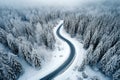 A Winter Drive through Nature\'s Bends from Above. AI Generated