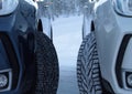 Winter drive safety. Studded tires against studless tires Royalty Free Stock Photo