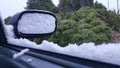 Winter driving condition of snow covered side mirror Royalty Free Stock Photo