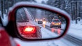 Winter Driving Conditions Perspective From a Snow Covered Car, Reflections In Side View Mirror Royalty Free Stock Photo