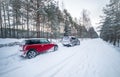 Cars on a difficult road, winter driving