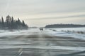 Blowing snow across the highway