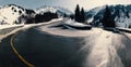 Winter Driving - Winter country road road through a mountains landscape