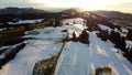 Winter drone photo of the Allgaeu Alps with the Gruenten in the backlight of the sun