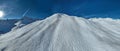 Winter drone shot of ski pistes and slopes covered with fresh powder snow in Tignes in Valdisere France