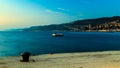 Colorful sunset in front of the city of Trieste Royalty Free Stock Photo