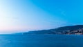 Colorful sunset in front of the city of Trieste Royalty Free Stock Photo
