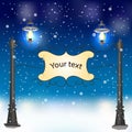 Winter evening landscape with vintage lampposts Royalty Free Stock Photo