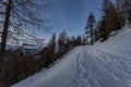 Winter view of Lastoi de Formin Peak, with curious snowballs rolled the slope