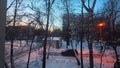 A winter evening with sunset in a Moscow residential courtyard. Timelapse. Moscow. Kuzminki district. 12.01.2024