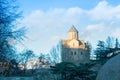 Winter evening in Tbilisi, bright warm sunlight over Metekhi St.