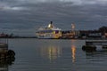 Winter evening view of South harbor embankment in Helsinki, Finland with Silja Symphony cargo-passenger cruise ferry moored at