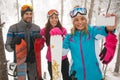 Winter, extreme sport and people concept- friends snowboarders o