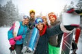 winter, extreme sport and people concept - Group of smiling friends making selfie Royalty Free Stock Photo