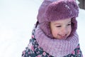 Winter, family, childhood concepts - close-up portrait authentic little preschool minor 3-4 years girl in pink hat look Royalty Free Stock Photo