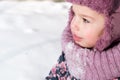 Winter, family, childhood concepts - close-up portrait authentic little preschool minor 3-4 years girl in pink hat look Royalty Free Stock Photo