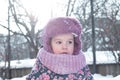 Winter, family, childhood concepts - close-up portrait authentic little preschool minor 3-4 years girl in pink hat look Royalty Free Stock Photo