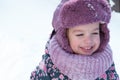 Winter, family, childhood concepts - close-up portrait authentic little preschool minor 3-4 years girl in pink hat look Royalty Free Stock Photo