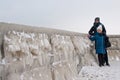 Winter family walk at Darlowo beach Royalty Free Stock Photo