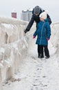 Winter family walk at Darlowo beach Royalty Free Stock Photo