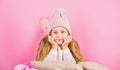 Winter fashion accessory. Kid girl knitted hat and scarf. Winter accessory concept. Girl long hair dream pink background Royalty Free Stock Photo