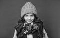 winter fashion. cheerful kid with curly hair in hat. female fashion model. teen girl in scarf.