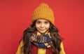 winter fashion. cheerful kid with curly hair in hat. female fashion model. teen girl in scarf.