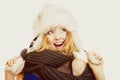 Winter fashion. Happy young woman in fur hat. Royalty Free Stock Photo