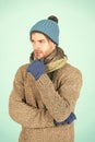 Winter fashion knitted clothes. Man knitted hat gloves and scarf winter fashion. Man wear knitted accessory turquoise Royalty Free Stock Photo