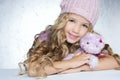 Winter fashion little girl hug teddy bear Royalty Free Stock Photo