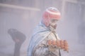 Winter festival called 'Els Enfarinats'. Ibi, Spain. A man carrying a tray of eggs to throw in a battle with flour