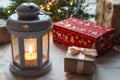 Winter festive concept. Christmas background. Lantern with candle, gifts and pine branches. Selective focus, copy space for Royalty Free Stock Photo