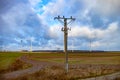 Winter field. On the horizon are visible wind power generators Royalty Free Stock Photo