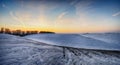 Winter field. picturesque hilly field Royalty Free Stock Photo