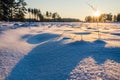 Winter fields sunset with snow