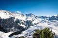 Winter fir trees in mountains covered with fresh snow. Royalty Free Stock Photo