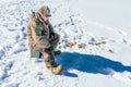 Winter fishing Fisherman enjoying a day on the ice Royalty Free Stock Photo