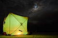 Winter fishing tent at night