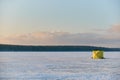 Winter fishing tent stands on the sea