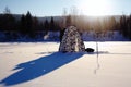 Winter fishing.Tent, taiga, forest, wild. The Urals landscape