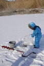 Winter fishing Young fisherman