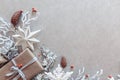 Winter flat lay with natural branches. leaves and presents on light background