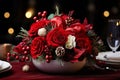 Winter flower arrangement with red roses, fir branches and Christmas decorations for holiday table decoration Royalty Free Stock Photo