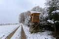 Winter forest. Deer Hunters hideout on the edge of the forest Royalty Free Stock Photo