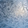 Winter frost patterns on glass. Ice crystals or cold winter background.Beautiful natural frosty pattern on winter window Royalty Free Stock Photo