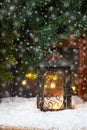 Winter  frost window with burning lantern, Christmas  or Advent time Royalty Free Stock Photo