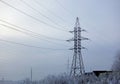 Winter. Frosty landscape. Transmission tower or electricity pylon to support an overhead power line. Russia Royalty Free Stock Photo