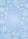 Winter frozen frame with snowflakes on blue backdrop. Royalty Free Stock Photo