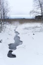 Winter frozen lake landscape in Finland Royalty Free Stock Photo