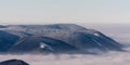 Winter frozen Moravskoslezske Beskydy mountains with Radhost hill in Czech republic